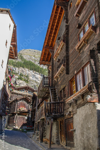 Traditional wooden buildings of Valais canton, Switzerland, at Zermatt (summer, blue sky) © AventuraSur