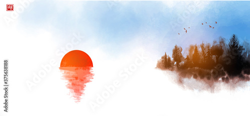 Misty forest island and big red sun. Traditional Japanese ink wash painting sumi-e. Translation of hieroglyph - zen