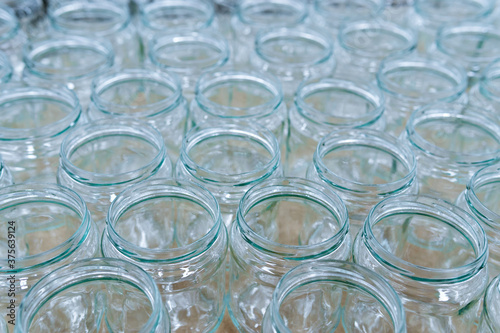 empty glass jars ready for canning - food industry background