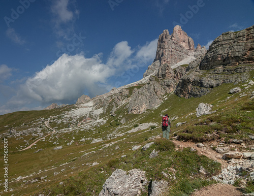 On trekking trail from Averau refuge, at the foot of Averau mountain, down to Passo Giau, Alta Via 1 long distance trek, Dolomites, South Tirol, Italy. 