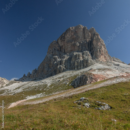 On trekking trail from Averau refuge, at the foot of Averau mountain, down to Passo Giau, Alta Via 1 long distance trek, Dolomites, South Tirol, Italy. 