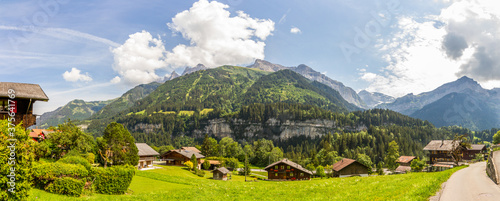 Φωτογραφία Panorama of Champéry, Switzerland, Canton Valais, with typical houses and mounta
