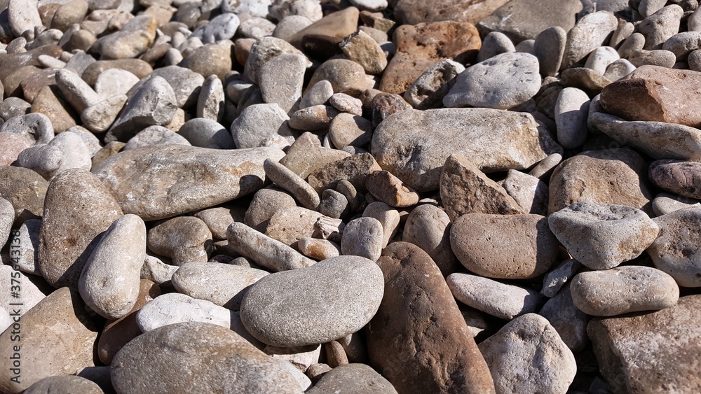 Natural pebbles and stones close-up by the sea, for backgrounds. Natural pebbles and stones close-up by the sea, for backgrounds.
