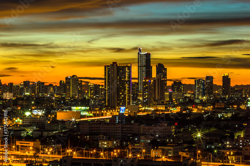 panoramic high-angle evening background of the city view,with natural beauty and blurred sunsets in the evening and the wind blowing all the time,showing the distribution of city center accommodation