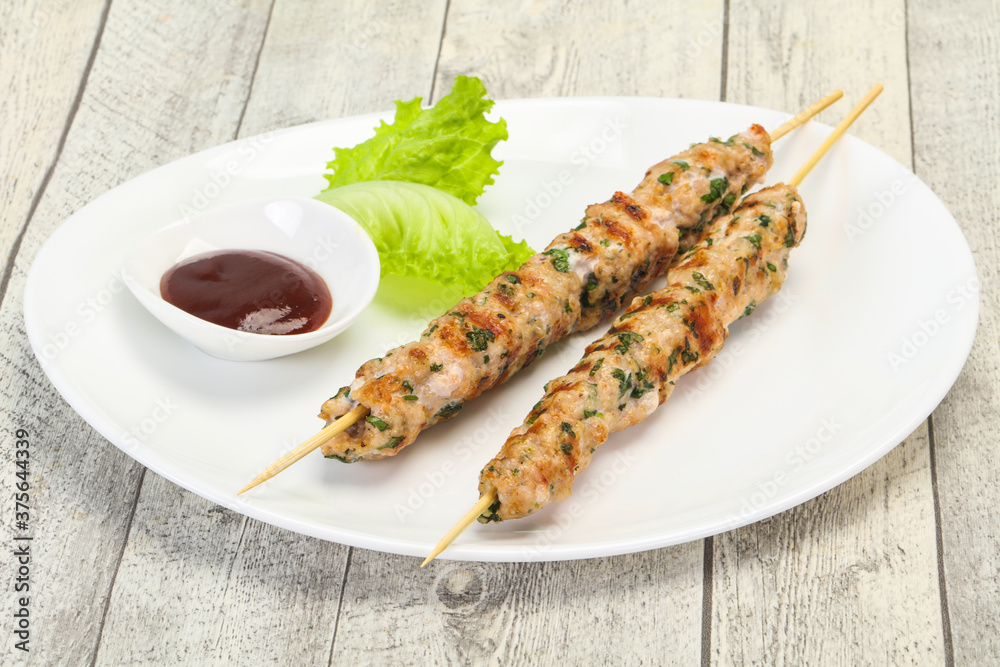 Minced pork skewer kebab with sauce Minced pork skewer kebab with sauce