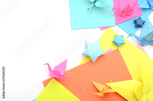 Origami objects folding on white background