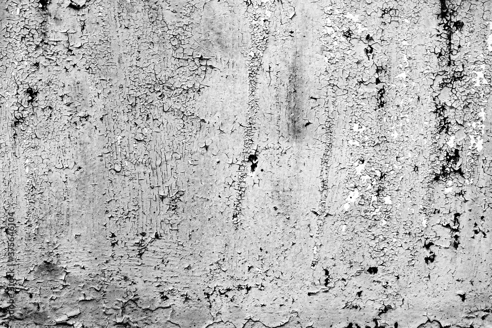 Fototapeta premium Metal texture with scratches and cracks which can be used as a background