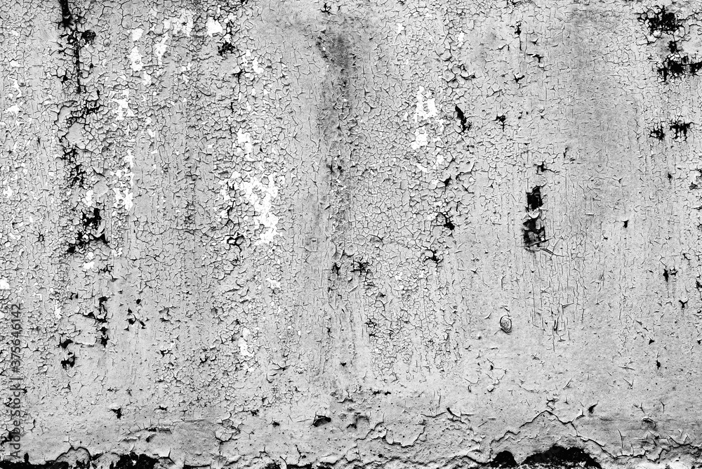 Fototapeta premium Metal texture with scratches and cracks which can be used as a background
