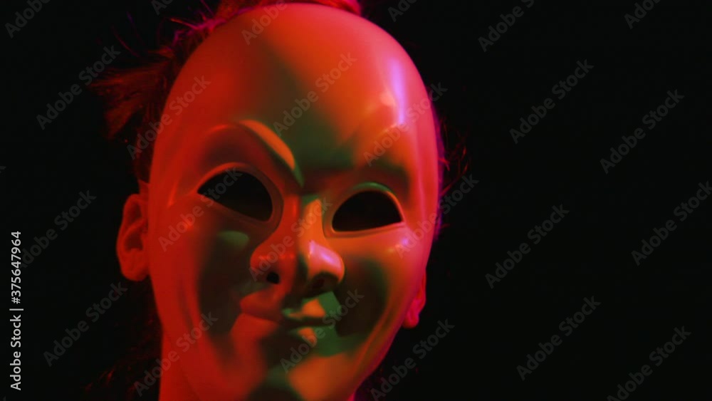 Women Dance in Masks in Colorful Lighting, Snap Zoom Closeup