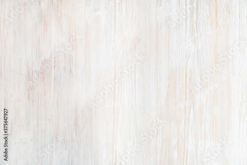 wooden background with texture painted with white paint.