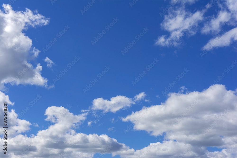 white fluffy clouds in a clear blue sky white fluffy clouds in a clear blue sky