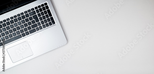 Simple layout of laptop, finance and minimal flat lay with copy space