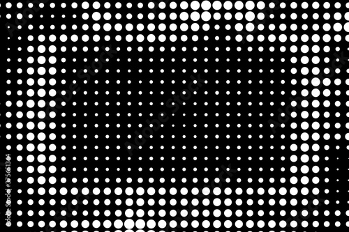 An abstract black and white halftone background image.