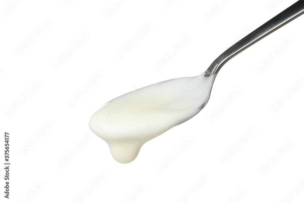 Spoon with sour cream yogurt isolated on white background Spoon with sour cream yogurt isolated on white background