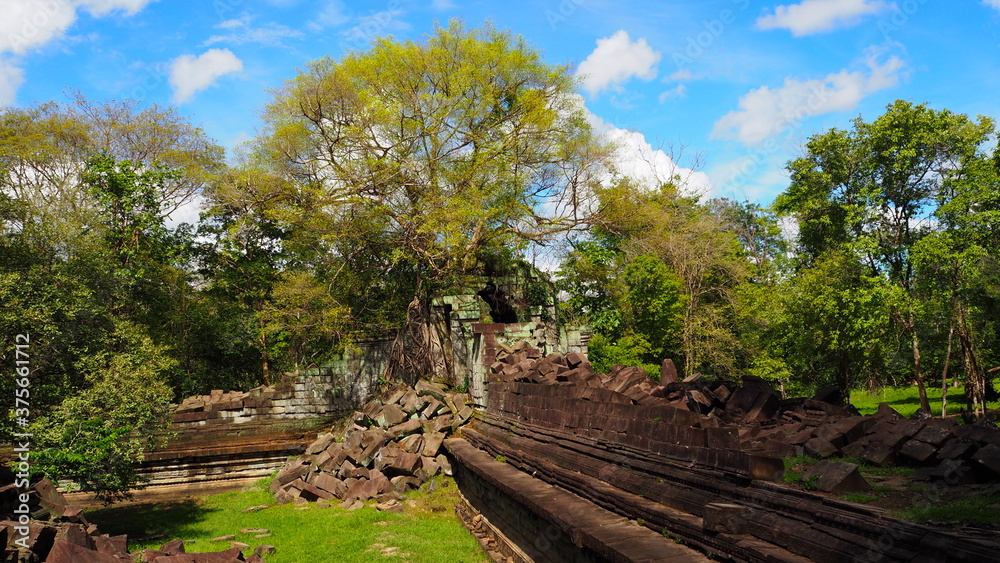 Cambodia Siem Reap-July 27, 2016: Ancient architecture and natural scenery in Angkor Wat Cambodia. Photo taken in outside area. (Lady temple, Water fall (Phnom Kulen), Beng Mealea temple and Tonle Sa Cambodia Siem Reap-July 27, 2016: Ancient architecture and natural scenery in Angkor Wat Cambodia. Photo taken in outside area. (Lady temple, Water fall (Phnom Kulen), Beng Mealea temple and Tonle Sa