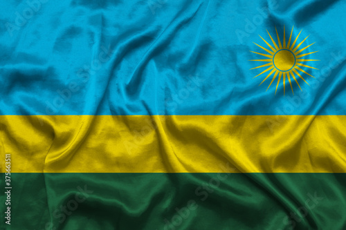 Rwanda national flag background with fabric texture. Flag of Rwanda waving in the wind. 3D illustration