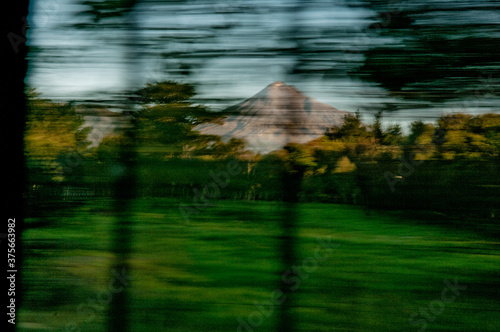 speedblur created by driving past Mount Taranak by car photo