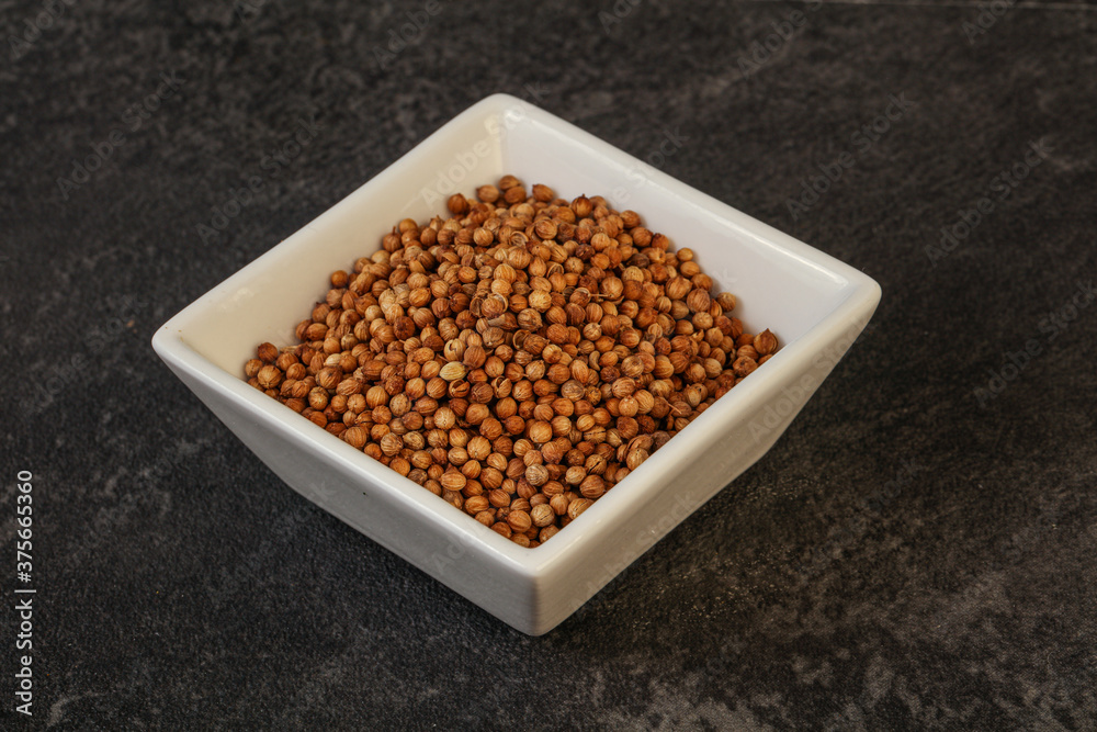 Coriander seeds in the bowl Coriander seeds in the bowl