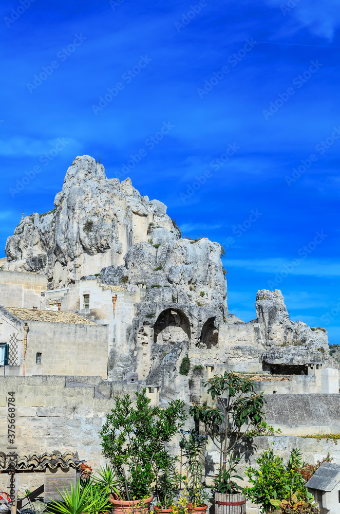 The sanctuary of Santa Maria de Idris is dug into the rock overlooking the Sasso Caveoso, on which stands a large wrought iron cross. It shows a lancet on the façade and a bell tower. Matera,Italy
