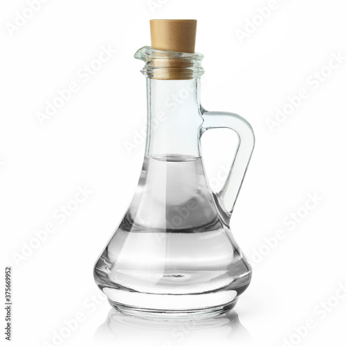 Foto Glass jar with water or some clear liquid, isolated on white background