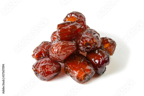 Red jujubes isolated on white background. Front views, close-up photo