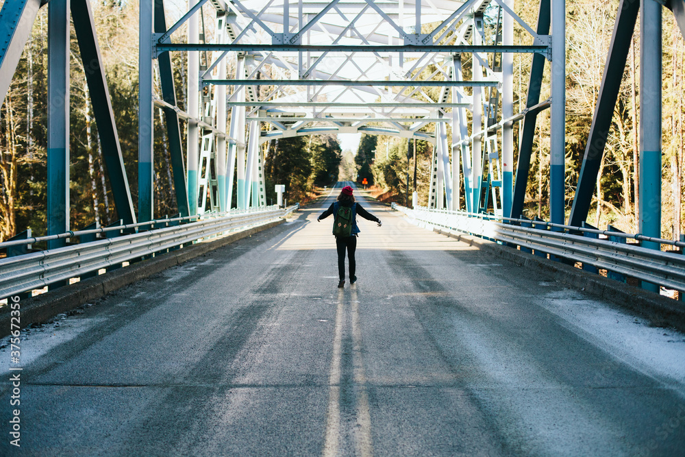 Young man on a bridge Young man on a bridge