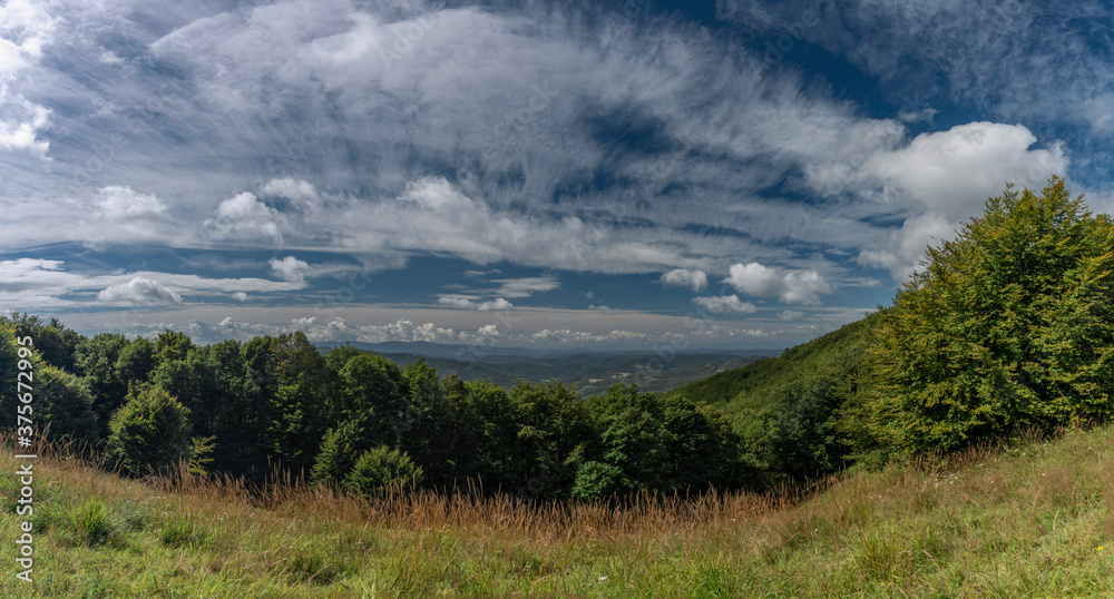 View from ridge of Poloniny national park in summer cloudy blue sky day View from ridge of Poloniny national park in summer cloudy blue sky day