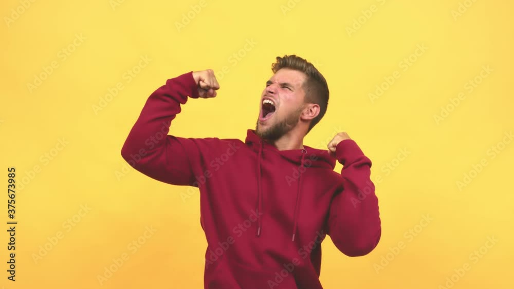 Young caucasian handsome man who does not surrender, shows power and dissatisfaction, dreams of fulfilling his goals Young caucasian handsome man who does not surrender, shows power and dissatisfaction, dreams of fulfilling his goals