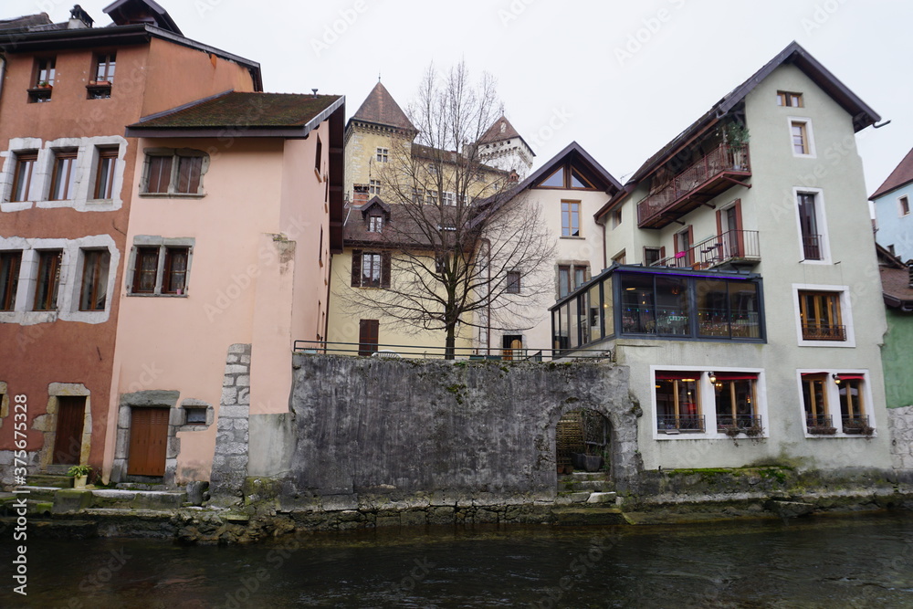canal in annecy, france with old stone buildings