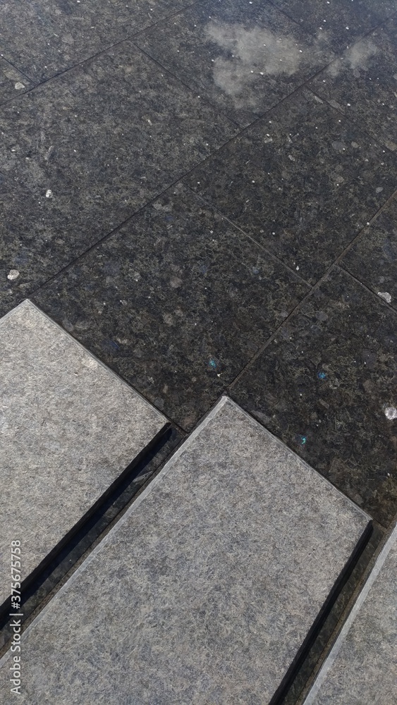 Fototapeta premium Decorative finishing of paving of street fountain