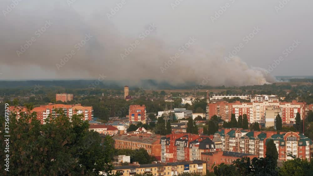 Burning Garbage dump pollutes the environment. The strong wind rises toxic smoke into the air over the city. Poltava, Ukraine, September 2020 Burning Garbage dump pollutes the environment. The strong wind rises toxic smoke into the air over the city. Poltava, Ukraine, September 2020