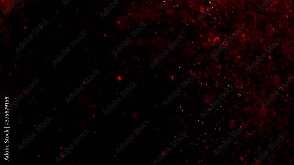 Abstract particles of red and orange liquid flow and float motion on black