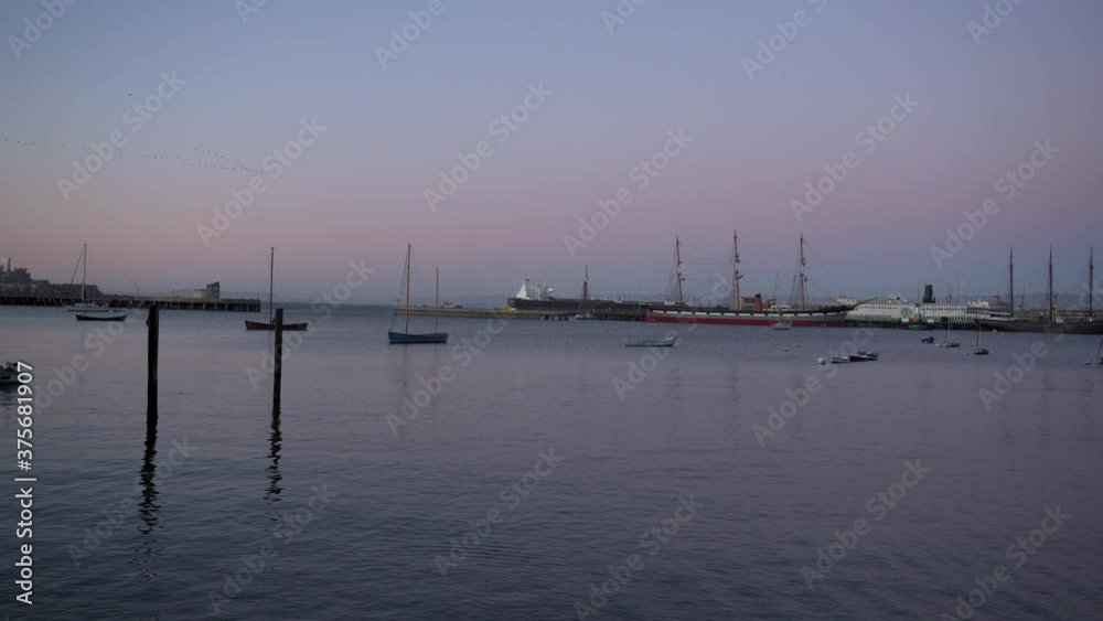 Twilight Over San Francisco Bay and Harbor With Vintage Sailing Ship, California USA Twilight Over San Francisco Bay and Harbor With Vintage Sailing Ship, California USA