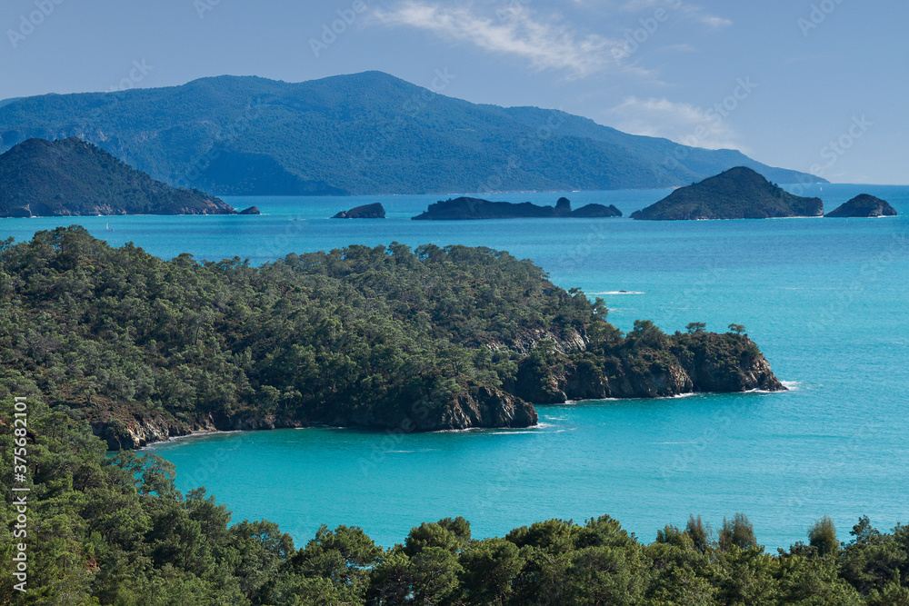 Turkish coastline with turquoise color water of the Aegean Sea, in Fethiye, Turkey