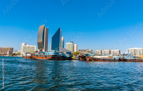Dhow boats moored on the higher reaches of the Dubai Creek in the UAE in springtime © Nicola