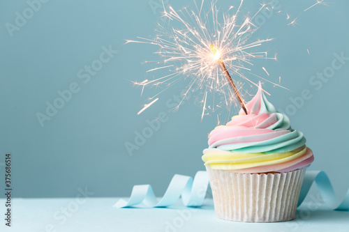 Rainbow birthday cupcake with sparkler