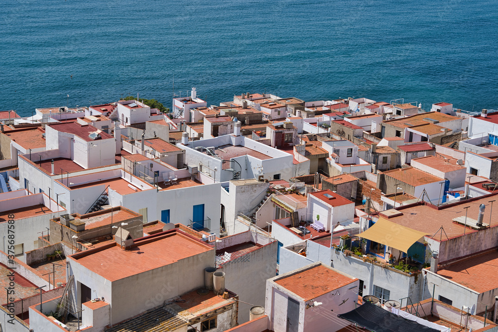 View of the Peniscola town Valencia, Spain. Tourism, Spanish landscape with deep blue sea and mediterranean architecture.
View of the Peniscola town Valencia, Spain. Tourism, Spanish landscape with deep blue sea and mediterranean architecture.
