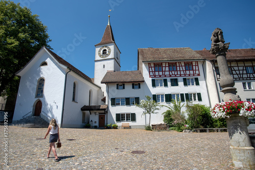 Regensberg, Switzerland, with a church and medieval buildings. photo