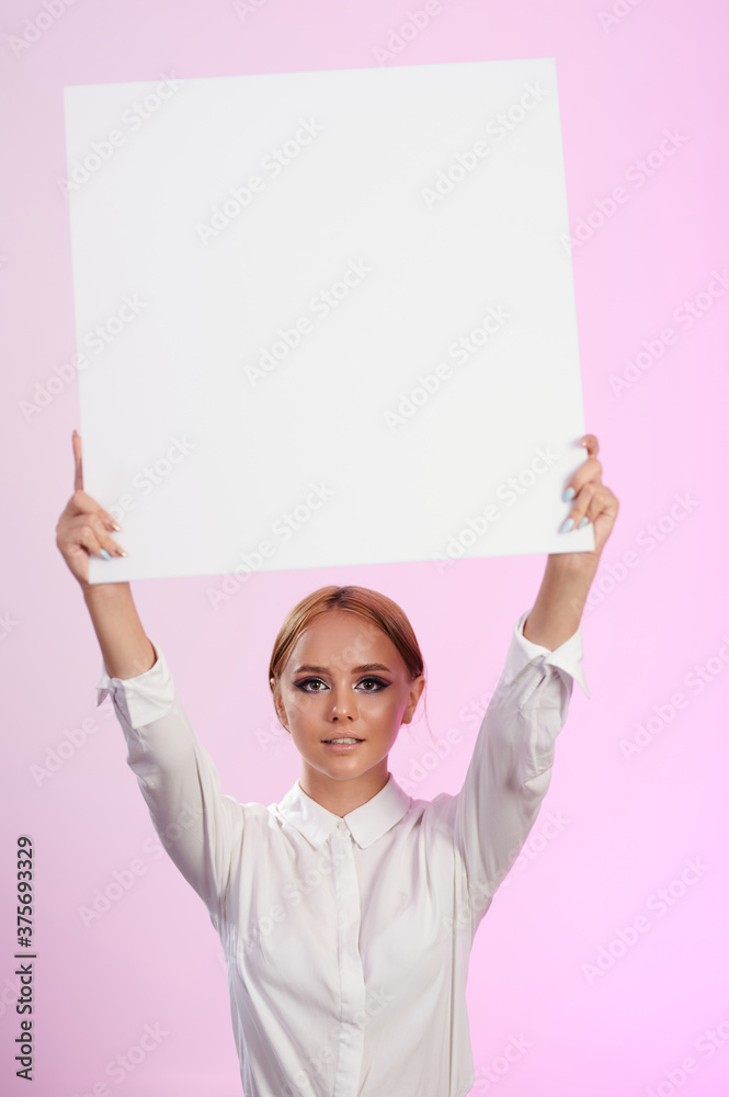 Young woman hold empty board