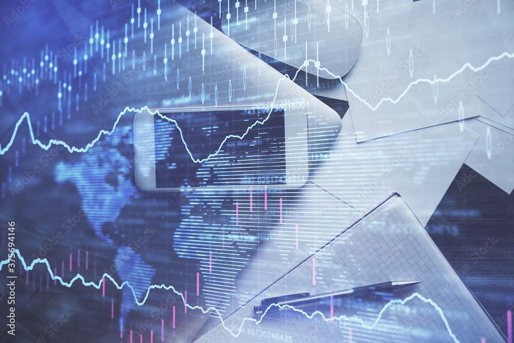 Multi exposure of forex graph hologram over desktop with phone. Top view. Mobile trade platform concept. Multi exposure of forex graph hologram over desktop with phone. Top view. Mobile trade platform concept.