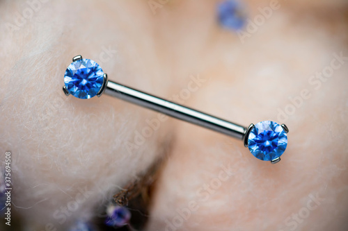 Beautiful piercing jewelry. Macro shot. Selective focus. photo