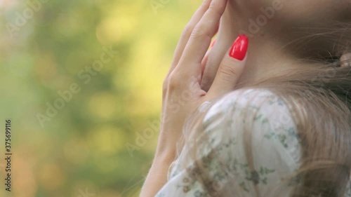 Beautiful young woman posing. Outdoor shoot photo