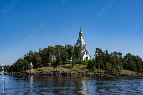 summer views of architectural ancient buildings on the pilgrim island on Lake Ladoga © константин константи