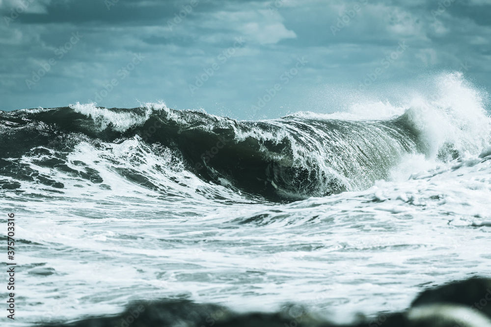 wave breaking on the rocks