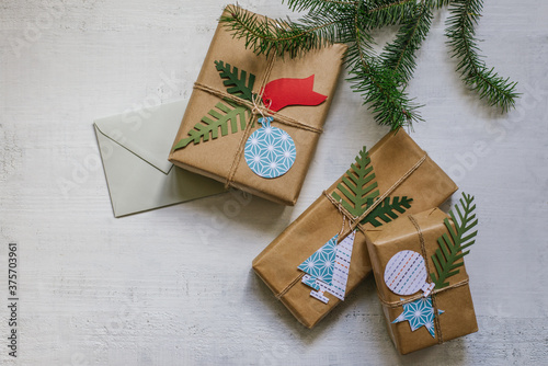 Christmas Card And Presents On The White Background
