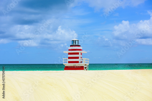 Lifeguard tower in Miami Beach. Atlantic Ocean background.