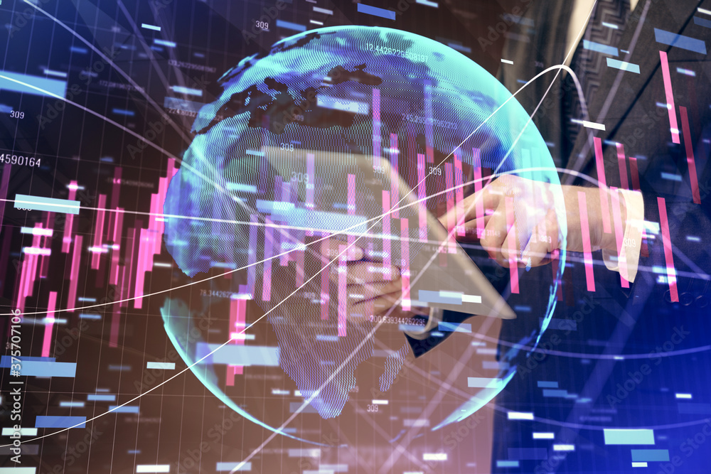 Fototapeta premium Double exposure of man's hands holding and using a digital device and forex graph drawing. Financial market concept.