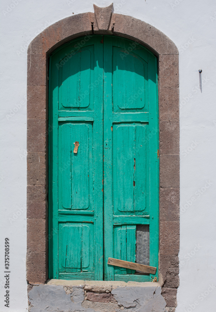 Old green european house door