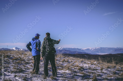Hikers planning their route