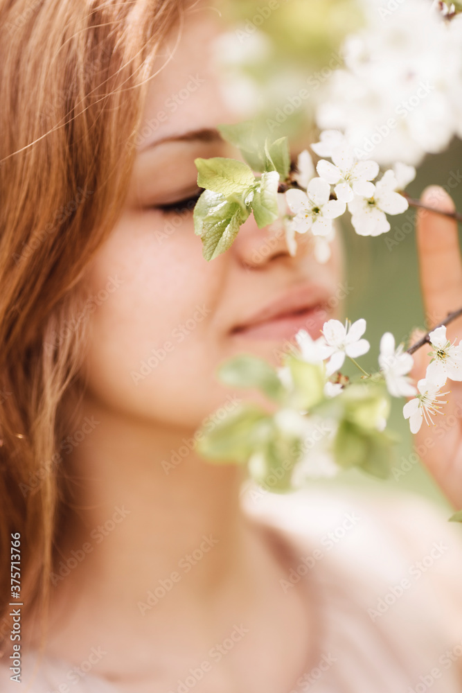 young woman and spring tree young woman and spring tree